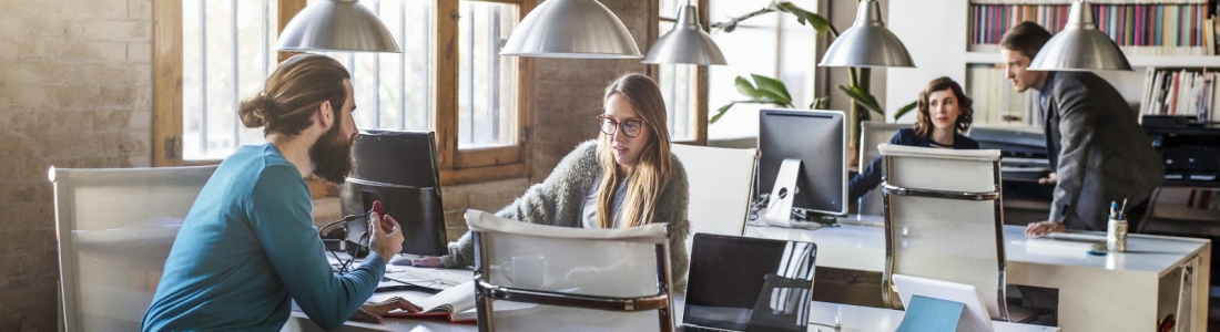 Young creative business people working in the office.