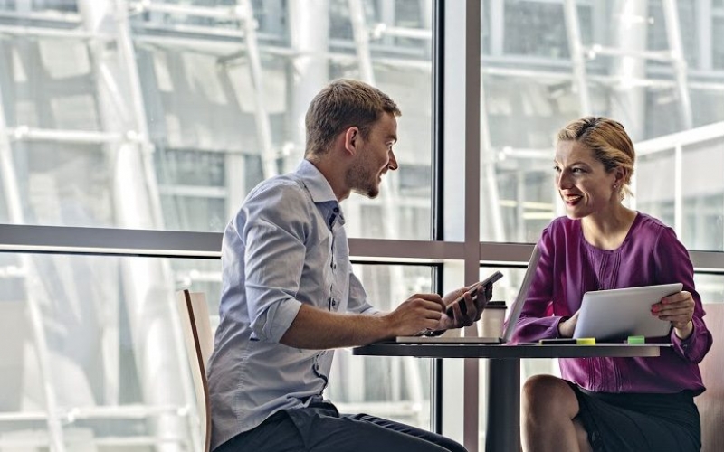 Young Business people working in modern lobby